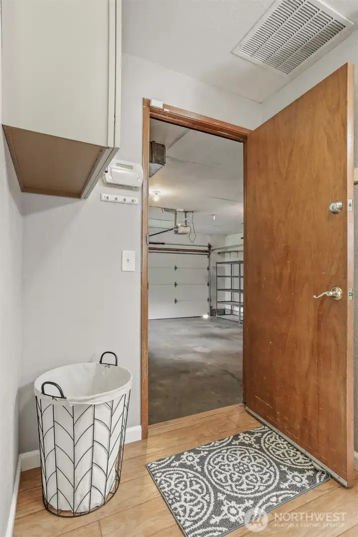 Across the hall from the laundry is access to the 2 car garage.