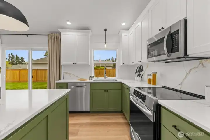 New quartz counters and full height backsplash.