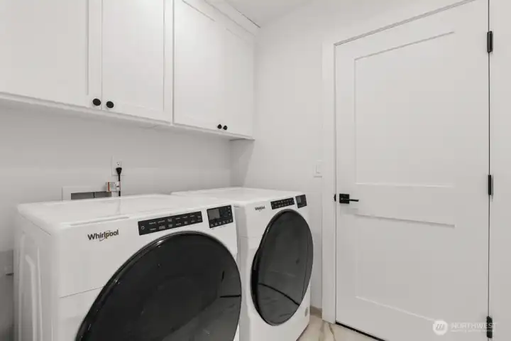 Laundry room is conveniently located just off the garage.