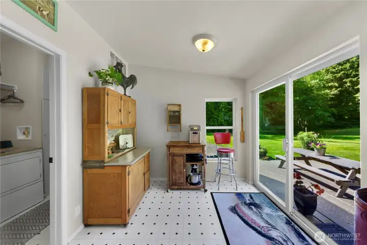 Breakfast nook with access to the backyard and patio