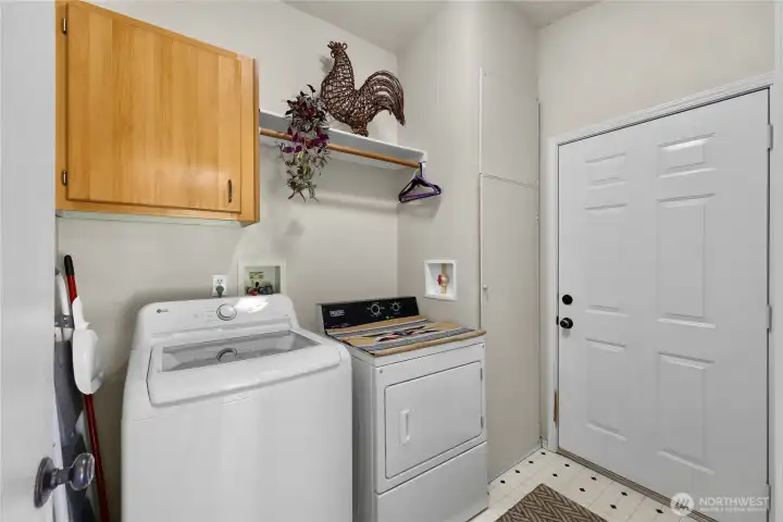 Handy pantry/utility room right off the kitchen and garage