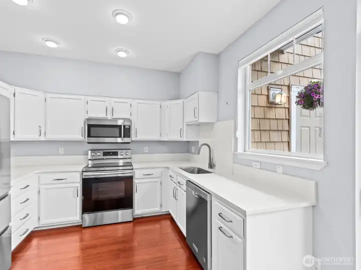 Bright and spacious kitchen has plenty of room for all of your cooking and baking needs. Bright and spacious kitchen has plenty of room for all of your cooking and baking needs.