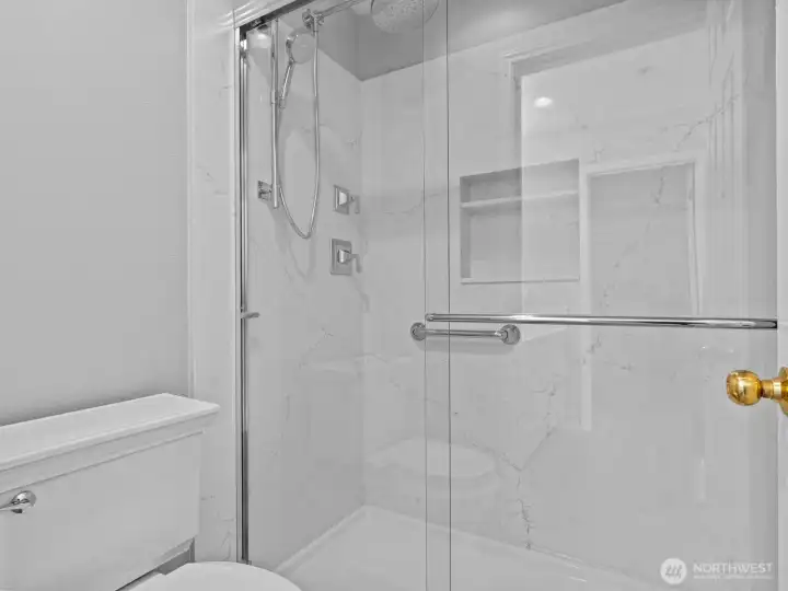 Gorgeous shower was redone to match the kitchen and vanities. Gorgeous shower was redone to match the kitchen and vanities.