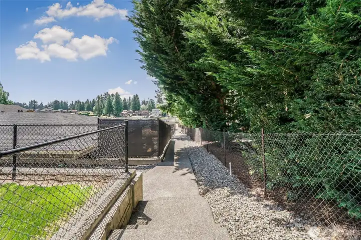 Shared walkway to storage and boat slip