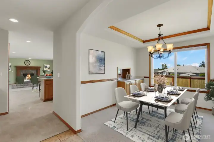 View from Dining Room into the Kitchen/Family Room-Virtually Staged