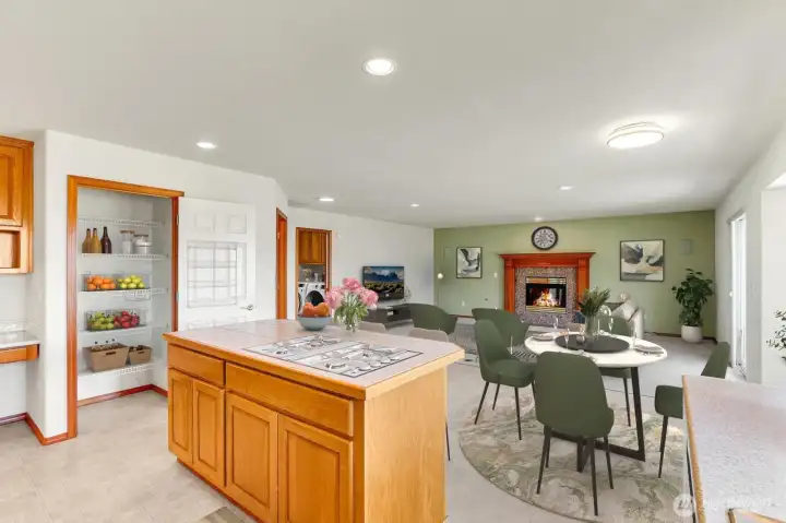 View from Kitchen to Pantry & Family Room - Virtually Staged