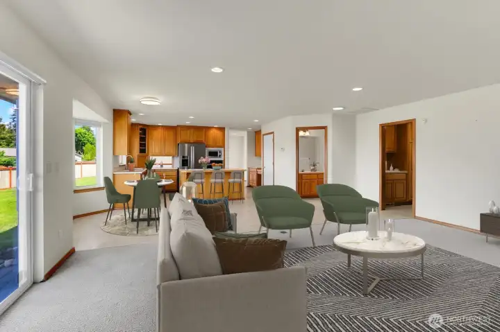 View from Family Room into Kitchen-Virtually Staged