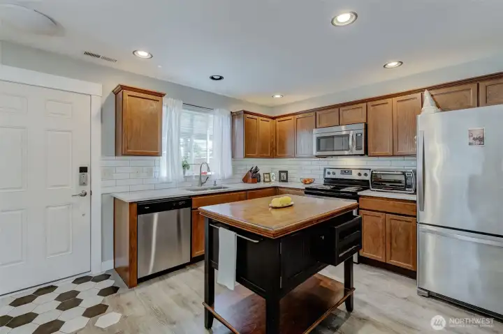 Luxury vinyl plank floors, beautiful tile accents