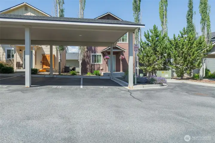 two dedicated covered parking spaces
