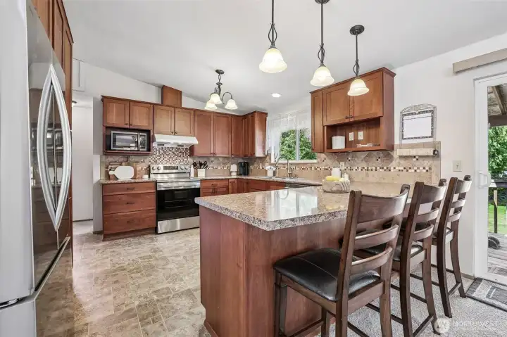 Large kitchen with counter.