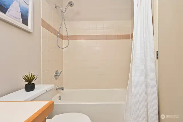 Main bath - view of bathtub & shower