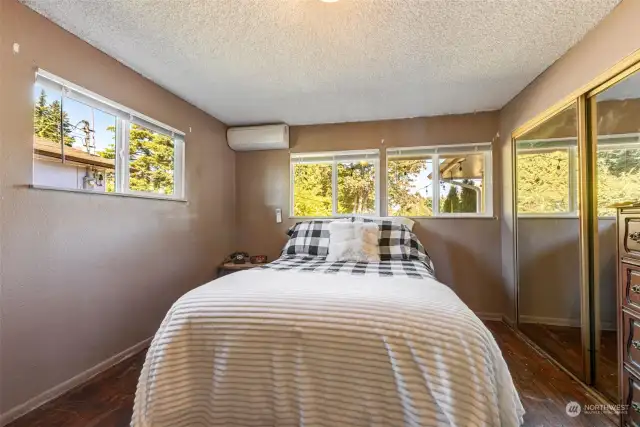 Bedroom #3 ~ all of the bedrooms have so many windows!  This one looks out to the backyard!