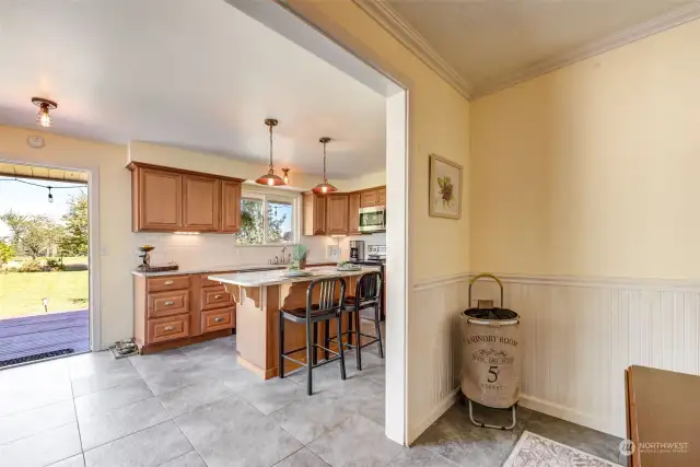 Dining room leads to the gorgeous kitchen!