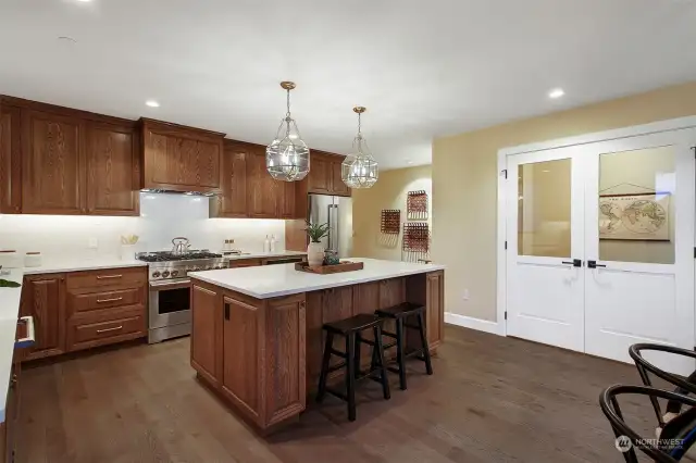 Ample seating at the kitchen island.