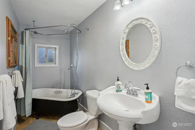 Main floor full bathroom with claw foot tub