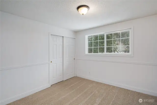 Bedroom 2 with new carpeting and fresh paint