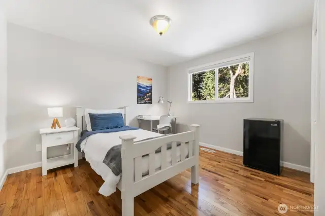 Bedroom 2 all main floor bedrooms have hardwood floors