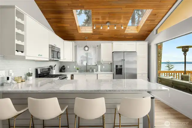 Granite countertops and large seating area