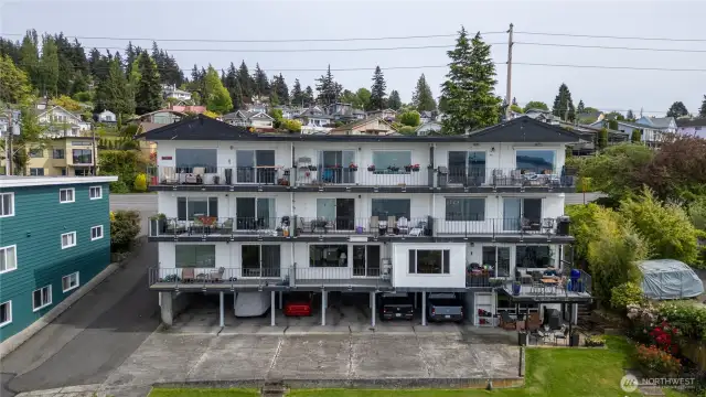 Unit is lower middle unit with spacious deck to enjoy view year round. Designated parking space is the second one in from driveway.