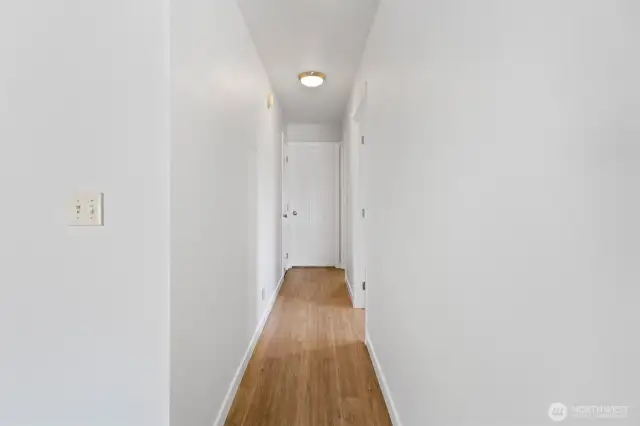 hallway to bedrooms, bath and linen closet