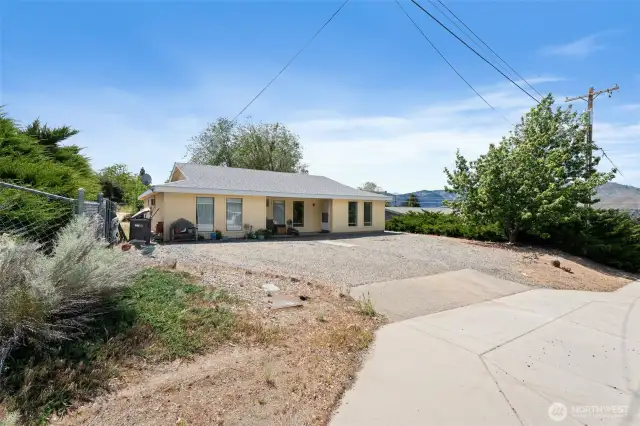Could add carport to large entrance in front of duplex