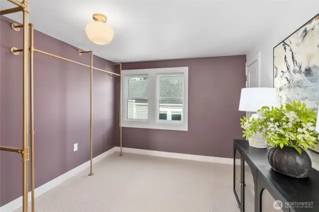 Open closet area offers tons of storage