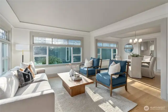 Lovely light and bright living room greets you when you enter the home