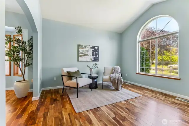 Family room which can also be a flex room with arched bay window, so much natural light