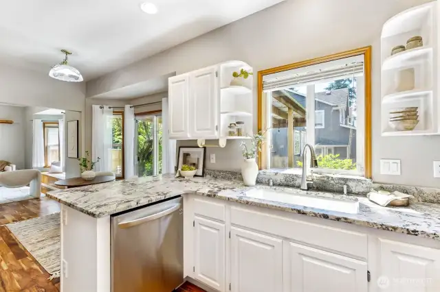 Beautiful, renovated and updated kitchen with new granite counters, cabinets and stainless steel appliances
