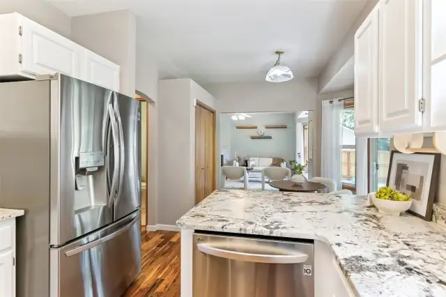 Beautiful, renovated and updated kitchen with new granite counters, cabinets and stainless steel appliances