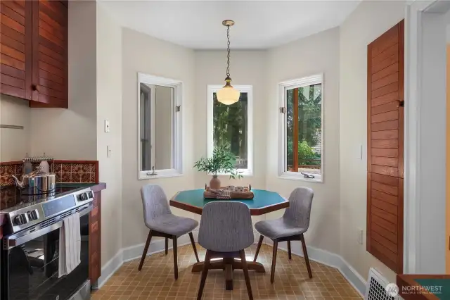 Breakfast nook with teak table that stays with the house.