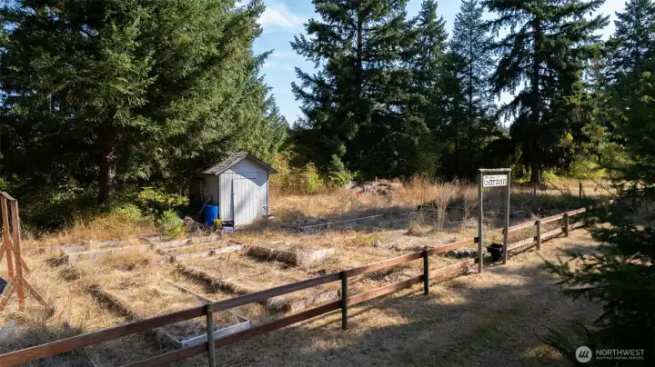 Garden with raised beds.  Bring your love of gardening and make it flourish