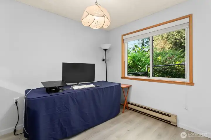 Dining room space being used as home office.