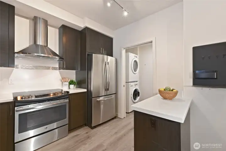 all stainless steel appliances and separate laundry room