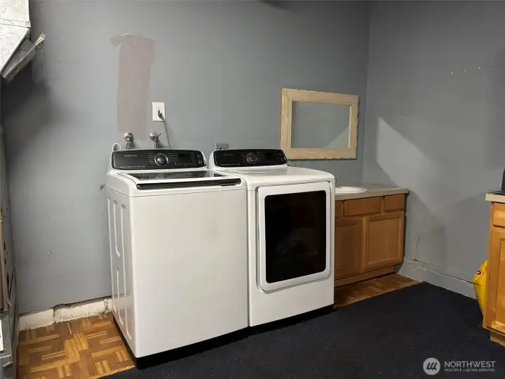 Laundry in converted garage area - Unit 2237