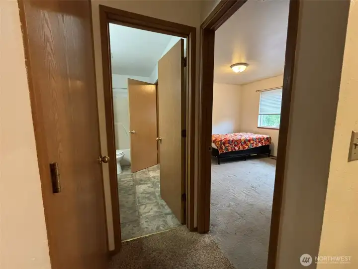 Upstairs hall into bedroom & bath