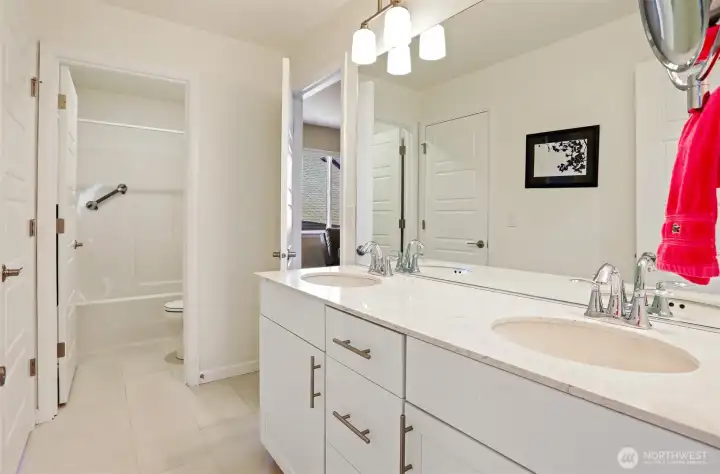 Upstairs 2nd floor hall 4 piece bathroom is a Jack and Jill layout with access to 3rd and 4th bedrooms.