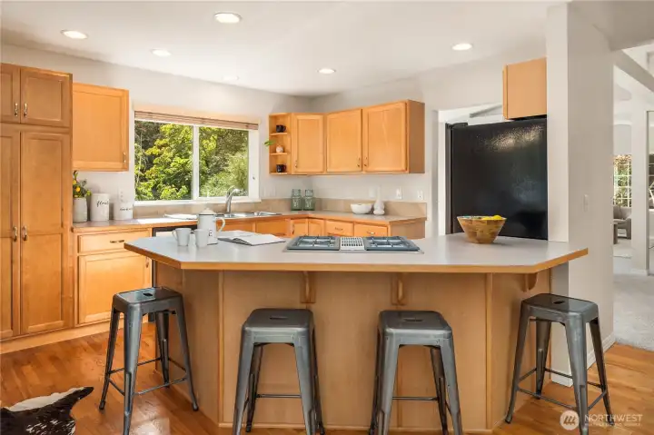 The breakfast bar easily handles 4 bar stools.