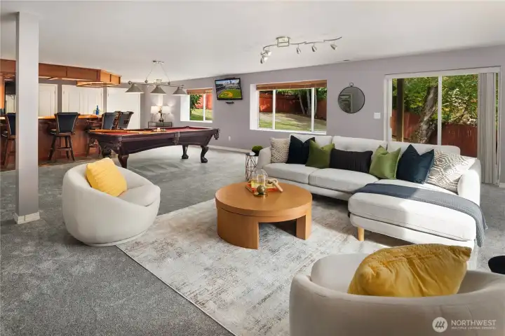 This enormous rec room is over 40' long and over 20' wide.