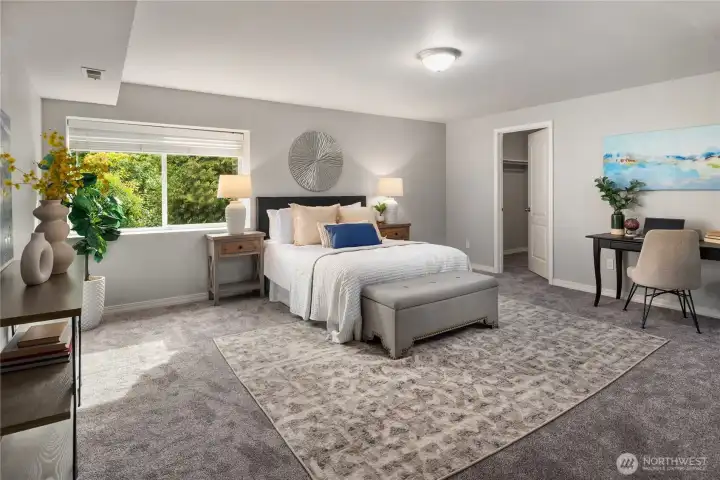 The fourth bedroom located downstairs is as large as the primary and features a big walk-in closet as well as a second closet to the left.