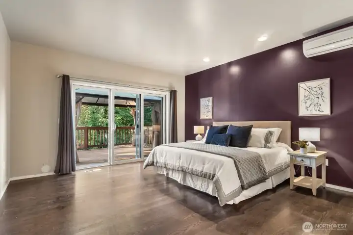 Primary suite with access to the deck.