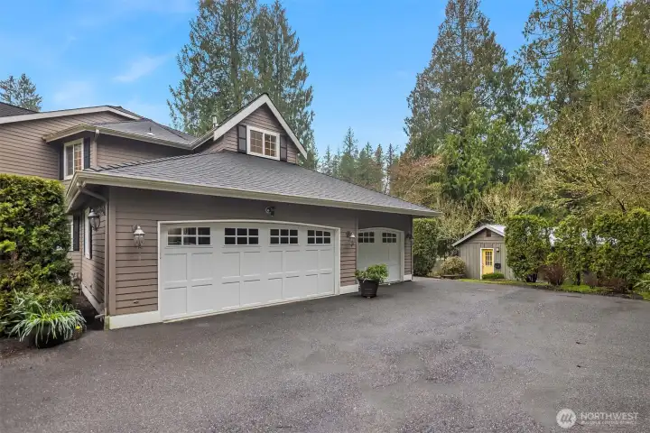 A big attached 3 car garage with lots of storage space & work shop / There is also a separate guest parking  area & designated spot for your boat or RV parking.