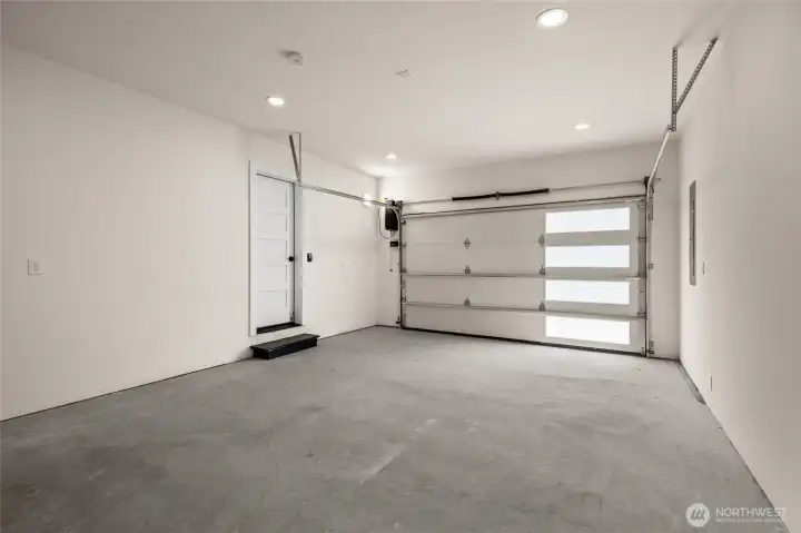 Extra space with a windows-designed framed garage door