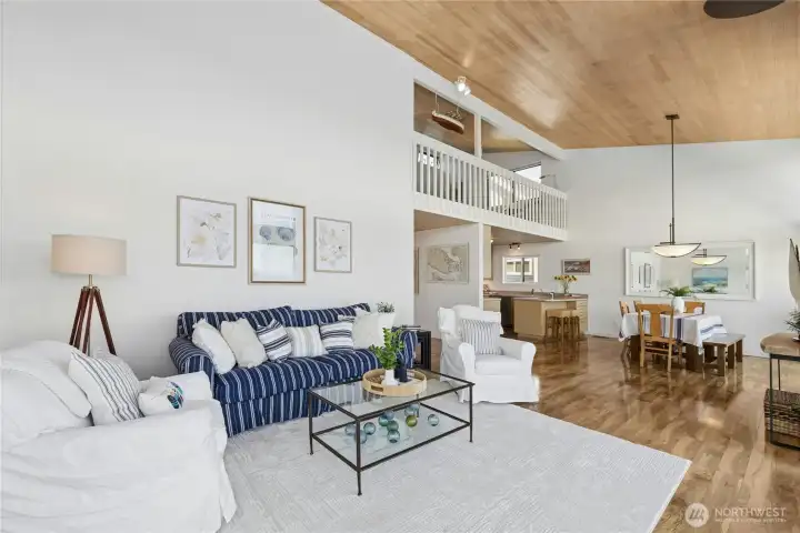 Open and Spacious great room concept with vaulted ceilng capturing the loft area.