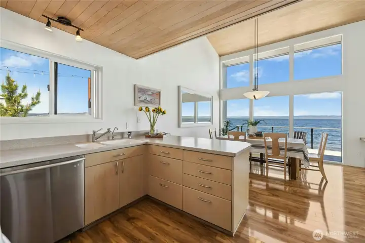 Kitchen and dining area captures the views,