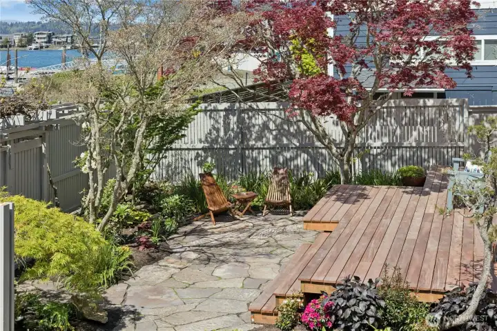 Front landscaped is designed for easy care.  New Tigerwood deck for enjoying the afternoon sun.