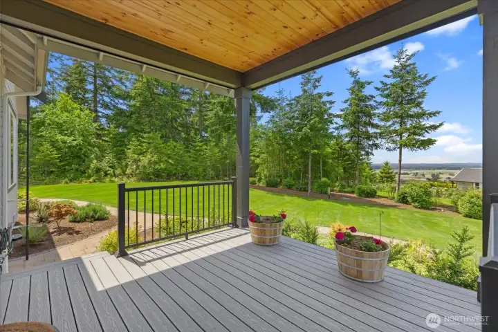 Wow! Beautiful covered deck with unending  views! Check out the wonderful valley views  and low maintenance yard. There are  automated sun shades on 3 sides.
