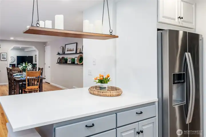 View from the kitchen to the dining area and family room.