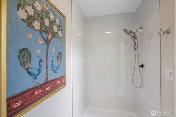 Brand new shower in the primary bath...new glass door will be installed prior to closing.