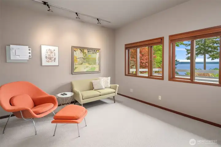 Light-filled upper-level flex room equally suited for media, office, or an inspiring work-from-home retreat.